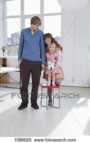 A hip young family, portrait View Large Photo Image Stock Photography - A hip young family, portrait. Fotosearch