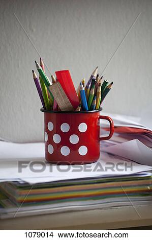 A painted tin mug full of colored pencils View Large Photo Image Picture - A painted tin mug full of colored pencils. Fotosearch