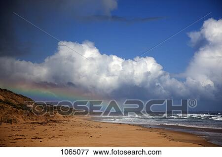 A rainbow in the sky View Large Photo Image Stock Photo - A rainbow in the sky. Fotosearch