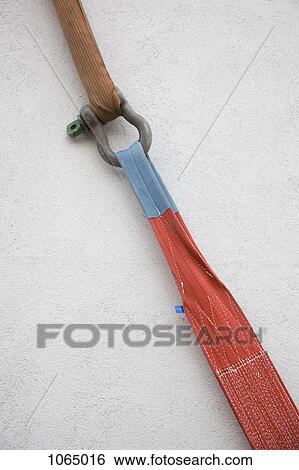 A strap with a shackle pulling another strap View Large Photo Image Stock Photograph - A strap with a shackle pulling another strap. Fotosearch