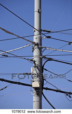 A utility pole with various wires and cables View Large Photo Image Stock Image - A utility pole with various wires and cables. Fotosearch