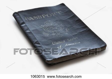 Stock Photography - A well-worn United States passport. Fotosearch