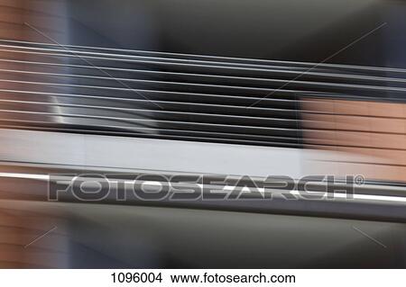 Abstract defocused view of elevated walkway View Large Photo Image Picture - Abstract defocused view of elevated walkway. Fotosearch