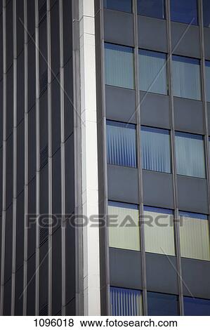 Stock Photo - Abstract facade of front and side of building. Fotosearch