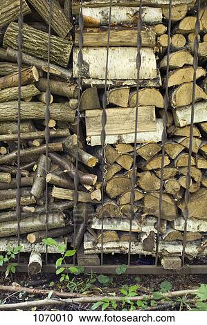 An abundance of chopped firewood View Large Photo Image Stock Image - An abundance of chopped firewood. Fotosearch