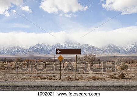 Arrow Sign On Highway at Californian Sierra Nevada View Large Photo Image Stock Image - Arrow Sign On Highway at Californian Sierra Nevada. Fotosearch