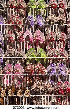 Beaded sandals displayed at a market stall View Large Photo Image Stock Image - Beaded sandals displayed at a market stall. Fotosearch