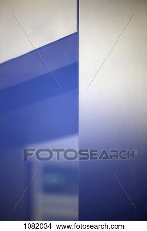 Blue light shining over elevator door View Large Photo Image Picture - Blue light shining over elevator door. Fotosearch