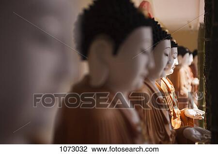 Buddhist statues View Large Photo Image Stock Image - Buddhist statues. Fotosearch