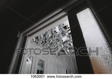 Bunch of silver helium balloons risen to the ceiling of a small room View Large Photo Image Stock Image - Bunch of silver helium balloons risen to the ceiling of a small room. Fotosearch