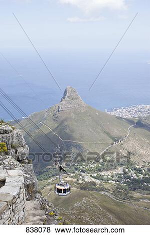 Cable car travelling from top of Table Mountain View Large Photo Image Stock Photo - Cable car travelling from top of Table Mountain. Fotosearch