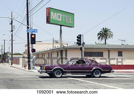 Car passing motel in Los Angeles, California View Large Photo Image Stock Image - Car passing motel in Los Angeles, California. Fotosearch