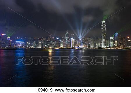 China, Hong Kong, Cityscape across water at night View Large Photo Image Stock Photo - China, Hong Kong, Cityscape across water at night. Fotosearch