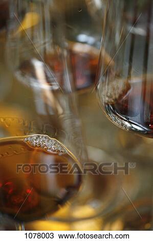 Detail of glasses of red wine View Large Photo Image Stock Image - Detail of glasses of red wine. Fotosearch