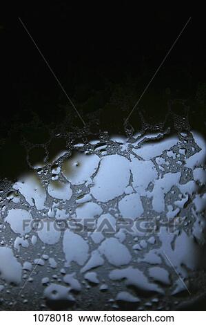 Detail of grease in a frying pan View Large Photo Image Stock Photo - Detail of grease in a frying pan. Fotosearch