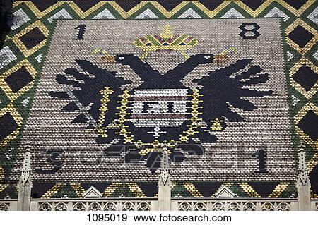 Double-headed eagle on the roof of St Stephen's Cathedral, Vienna View Large Photo Image Stock Photo - Double-headed eagle on the roof of St Stephen's Cathedral, Vienna. Fotosearch
