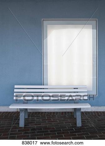 Empty bench on tiled floor in front of window View Large Photo Image Stock Photo - Empty bench on tiled floor in front of window. Fotosearch