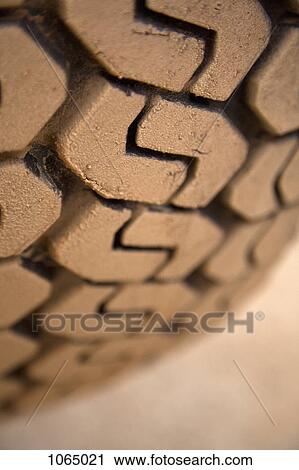 Extreme close up, muddy tire tread View Large Photo Image Stock Image - Extreme close up, muddy tire tread. Fotosearch