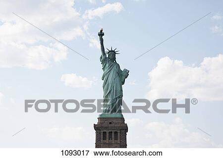 Stock Photo - Front view of Statue of Liberty on her pedestal. Fotosearch