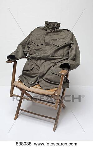 Invisible man on chair View Large Photo Image Stock Photo - Invisible man on chair. Fotosearch