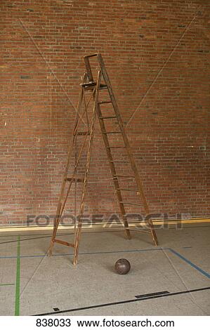 Ladder and football in sports hall View Large Photo Image Stock Image - Ladder and football in sports hall. Fotosearch
