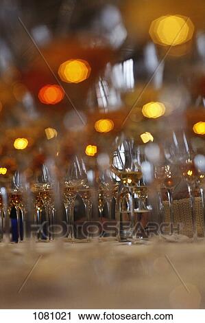 Large group of wine glasses on table ready for wine tasting View Large Photo Image Stock Image - Large group of wine glasses on table ready for wine tasting. Fotosearch