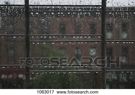 Looking out a window on a gloomy rainy day View Large Photo Image Stock Photo - Looking out a window on a gloomy rainy day. Fotosearch