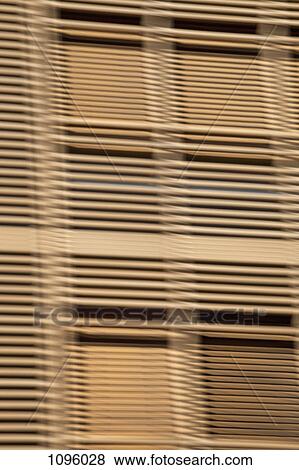 Louvered wooden slats in front of window View Large Photo Image Stock Photo - Louvered wooden slats in front of window. Fotosearch