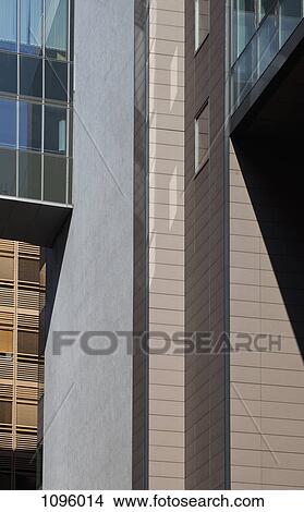 Merge of shapes from shadows along building facade View Large Photo Image Picture - Merge of shapes from shadows along building facade. Fotosearch