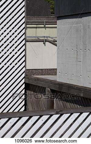 Merge of shapes of striped fence, wooden walkway and surrounding wall View Large Photo Image Stock Photograph - Merge of shapes of striped fence, wooden walkway and surrounding wall. Fotosearch