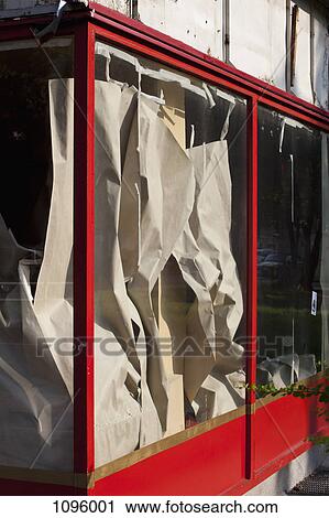 Messy paper covering behind front window View Large Photo Image Stock Image - Messy paper covering behind front window. Fotosearch