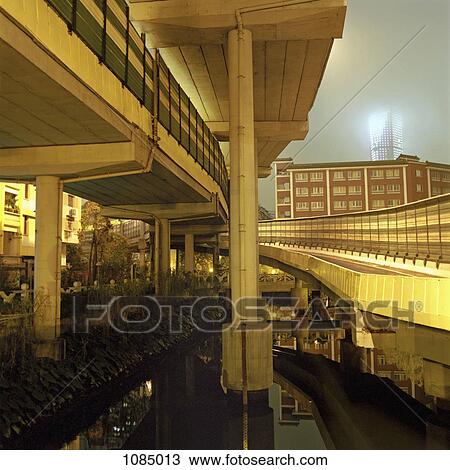 Stock Image - Overpass and buildings Guangzhou, China. Fotosearch