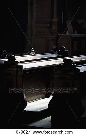 Stock Photo - Pews in a church, close-up. Fotosearch