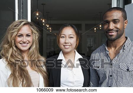 Stock Photo - Portrait of three colleagues. Fotosearch