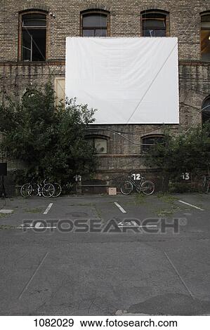 Projection screen in empty car park at Postfuhramt Building View Large Photo Image Stock Photo - Projection screen in empty car park at Postfuhramt Building. Fotosearch