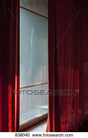 Red Curtains draped in front of dirty window View Large Photo Image Stock Image - Red Curtains draped in front of dirty window. Fotosearch