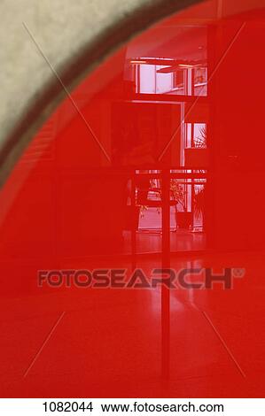 Reflection of windows against bright red object on wall View Large Photo Image Picture - Reflection of windows against bright red object on wall. Fotosearch