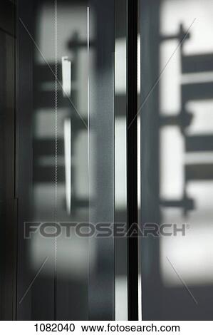 Reflections on glass doors View Large Photo Image Stock Image - Reflections on glass doors. Fotosearch