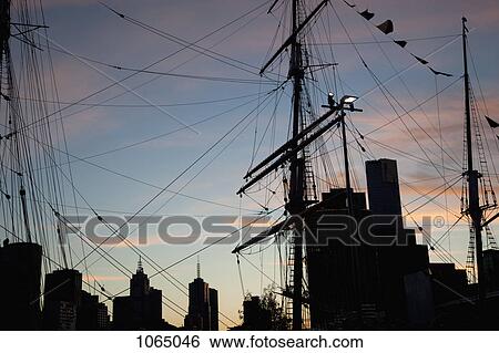 Rigging and mast of a ship at sunset View Large Photo Image Stock Photograph - Rigging and mast of a ship at sunset. Fotosearch