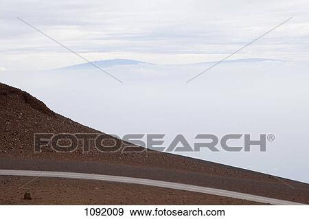 Road on cliffs edge at Haleakala Maui, Hawaii View Large Photo Image Stock Photo - Road on cliffs edge at Haleakala Maui, Hawaii. Fotosearch
