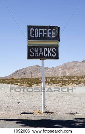 Roadside sign advertising coffee and snacks, Baker, California View Large Photo Image Stock Photograph - Roadside sign advertising coffee and snacks, Baker, California. Fotosearch