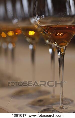 Row of white wine glasses ready for wine tasting View Large Photo Image Stock Photo - Row of white wine glasses ready for wine tasting. Fotosearch