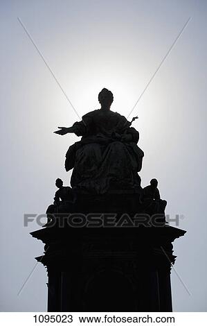 Stock Image - Silhouetted statue of the Empress Maria Theresa, Vienna, Austria. Fotosearch