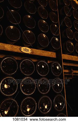 Stack of wine bottles categorized by year View Large Photo Image Picture - Stack of wine bottles categorized by year. Fotosearch