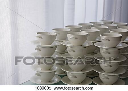 Stacks of cups and saucers View Large Photo Image Stock Photography - Stacks of cups and saucers. Fotosearch