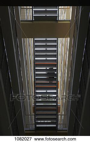 Staircase viewed from below View Large Photo Image Stock Photo - Staircase viewed from below. Fotosearch