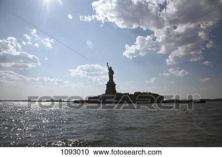 Stock Image - Statue of Liberty in silhouette. Fotosearch