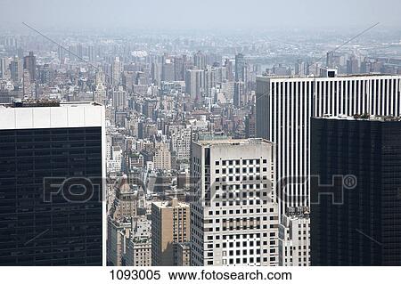 Stock Photography - The view over Manhattan, hazy sky. Fotosearch