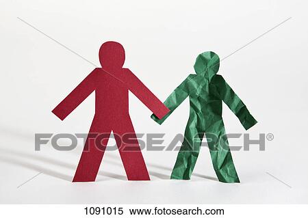 Two paper dolls holding hands, one crumpled View Large Photo Image Stock Photography - Two paper dolls holding hands, one crumpled. Fotosearch