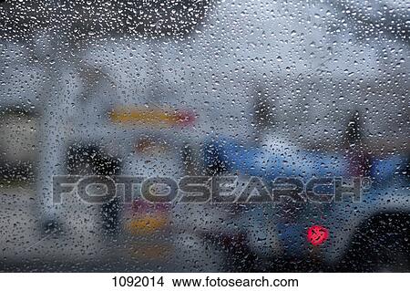 Vehicle seen through condensation on window View Large Photo Image Picture - Vehicle seen through condensation on window. Fotosearch